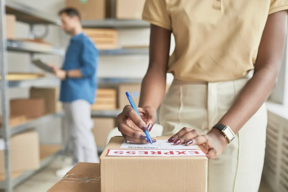A couple cleaning out their garage